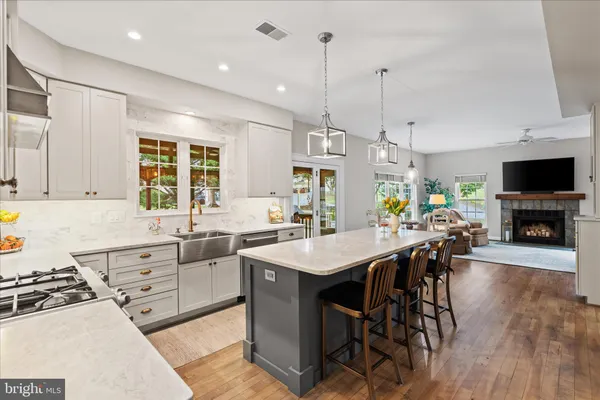 a kitchen with a refrigerator a sink and a refrigerator