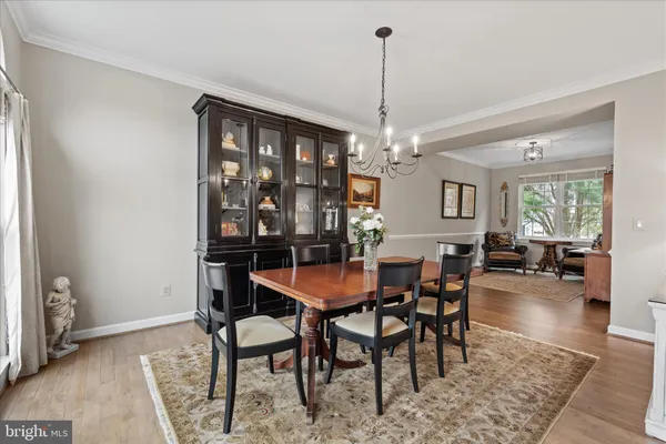 a living room with furniture rug and window