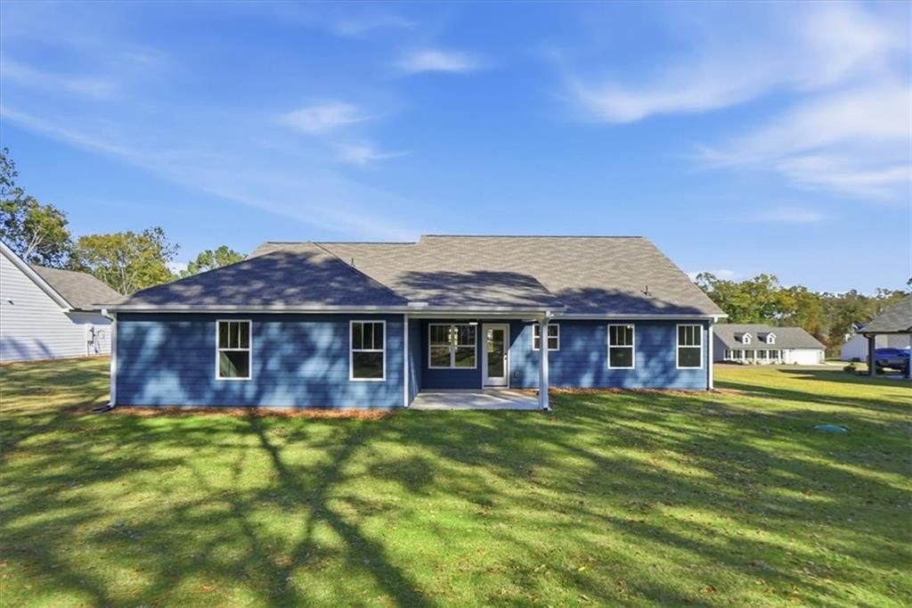 184 Rachel Lane Hartwell, GA 30643 - Photo 42 of 58 a view of a house with a big yard and potted plants