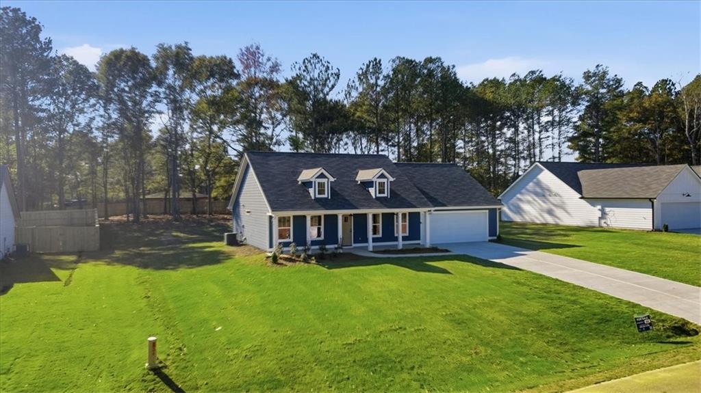 184 Rachel Lane Hartwell, GA 30643 - Photo 48 of 58 an aerial view of a house with swimming pool and yard with green space