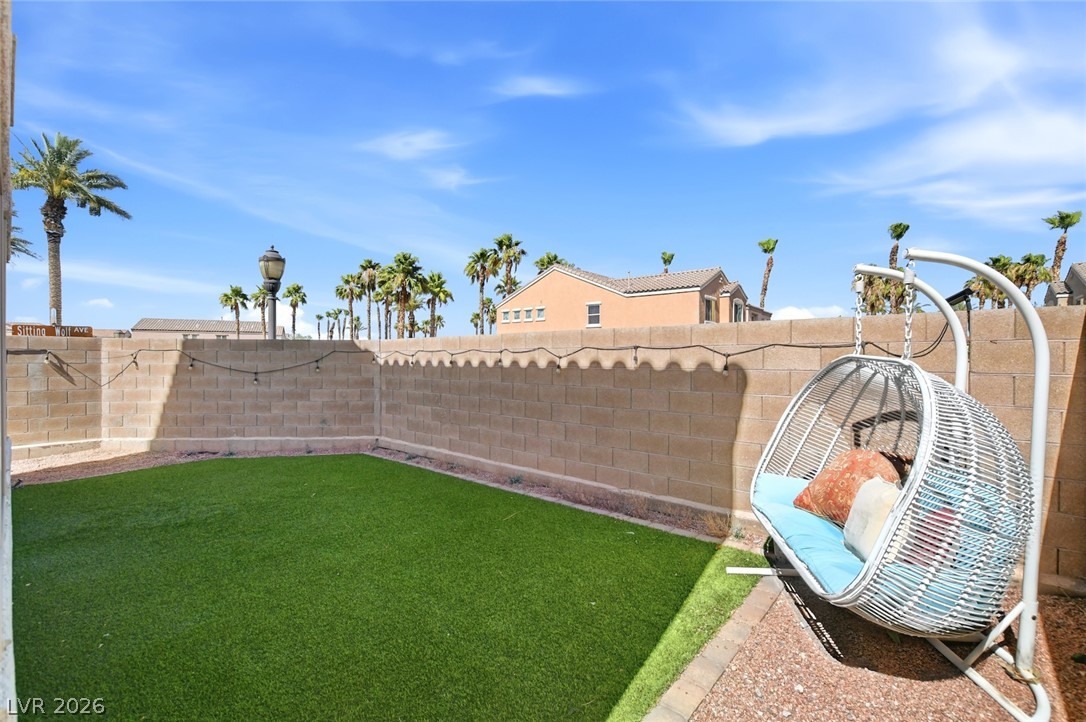 48 Jasmine Point Street Henderson, NV 89074 - Photo 55 of 62 A private, low-maintenance yard offers an ideal setting for relaxation.