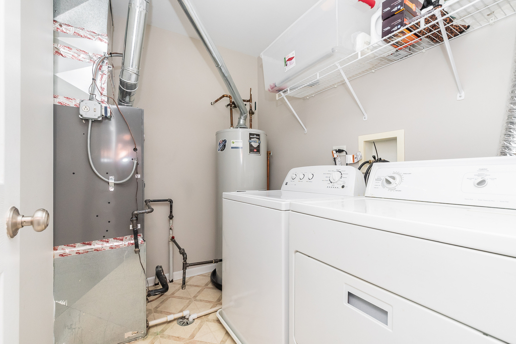 2518 Golf Ridge Circle, Unit 2518 Naperville, IL 60563 - Photo 14 of 25 a utility room with dryer and washer