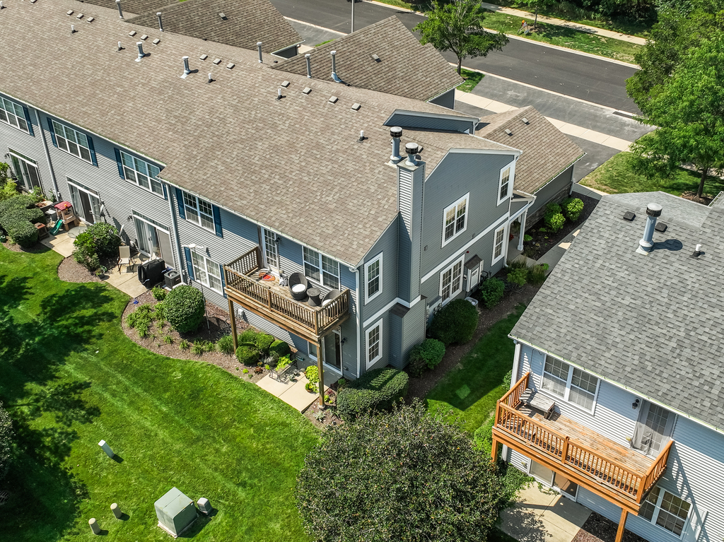 2518 Golf Ridge Circle, Unit 2518 Naperville, IL 60563 - Photo 17 of 25 an aerial view of a house with balcony and trees