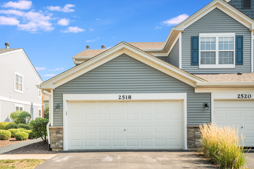 2518 Golf Ridge Circle, Unit 2518 Naperville, IL 60563 - Photo 2 of 25 a view of a house with garage