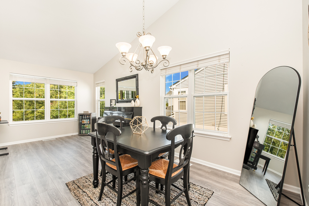 2518 Golf Ridge Circle, Unit 2518 Naperville, IL 60563 - Photo 5 of 25 a view of a dining room with furniture window and outside view