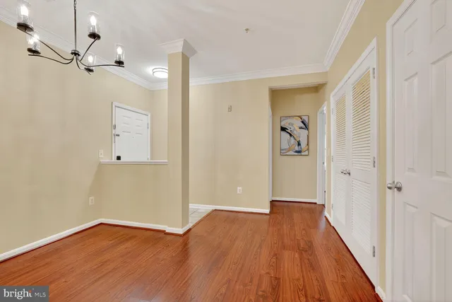 a kitchen with stainless steel appliances granite countertop a refrigerator sink and stove