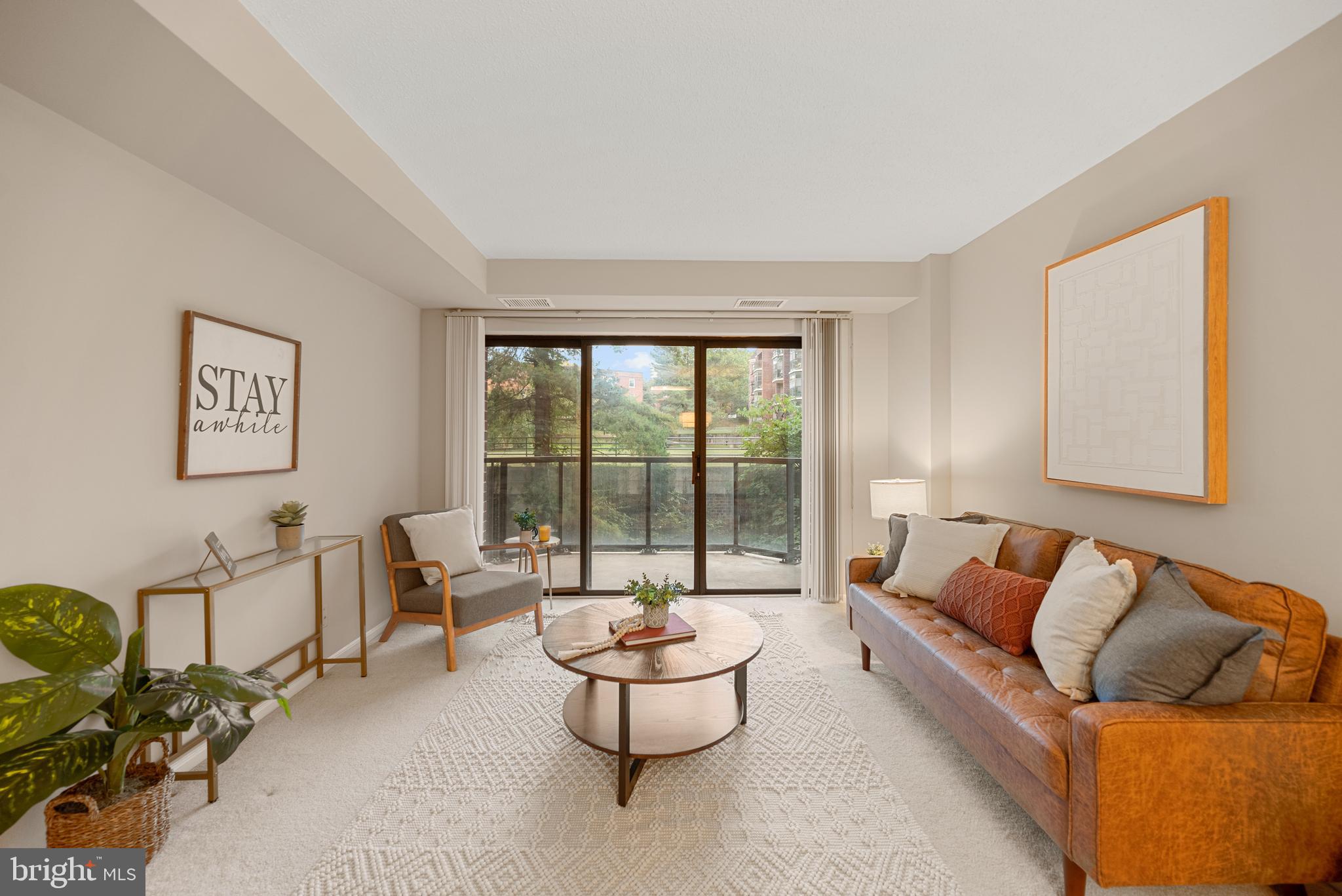 2100 Langston Boulevard, Unit 112 Arlington, VA 22201 - Photo 2 of 33 Light-Filled Living Room