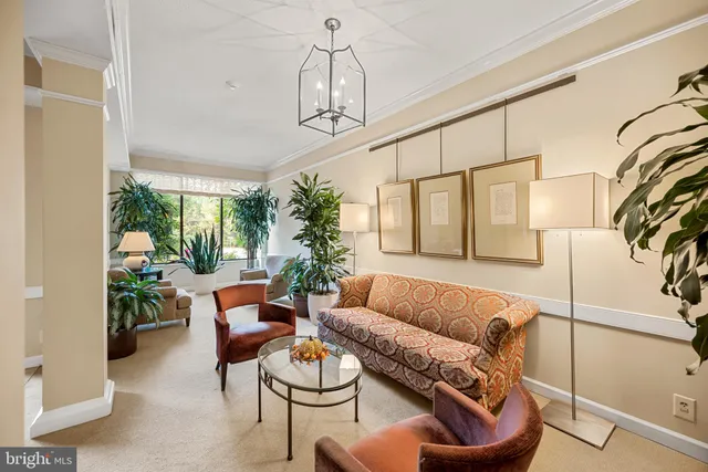 a living room with fireplace furniture and a flat screen tv