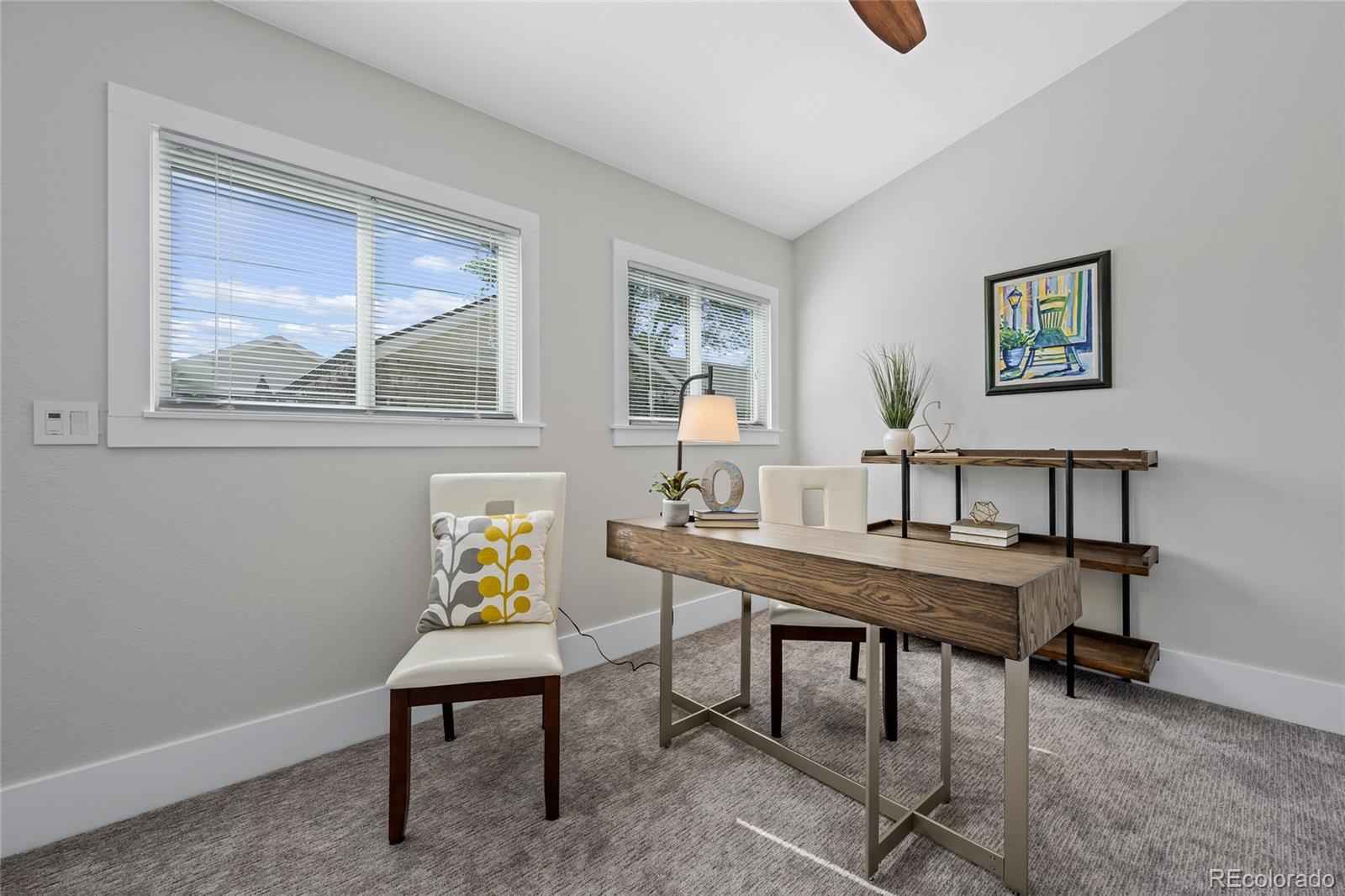 2829 Ash Street Denver, CO 80207 - Photo 25 of 40 a view of a workspace with furniture