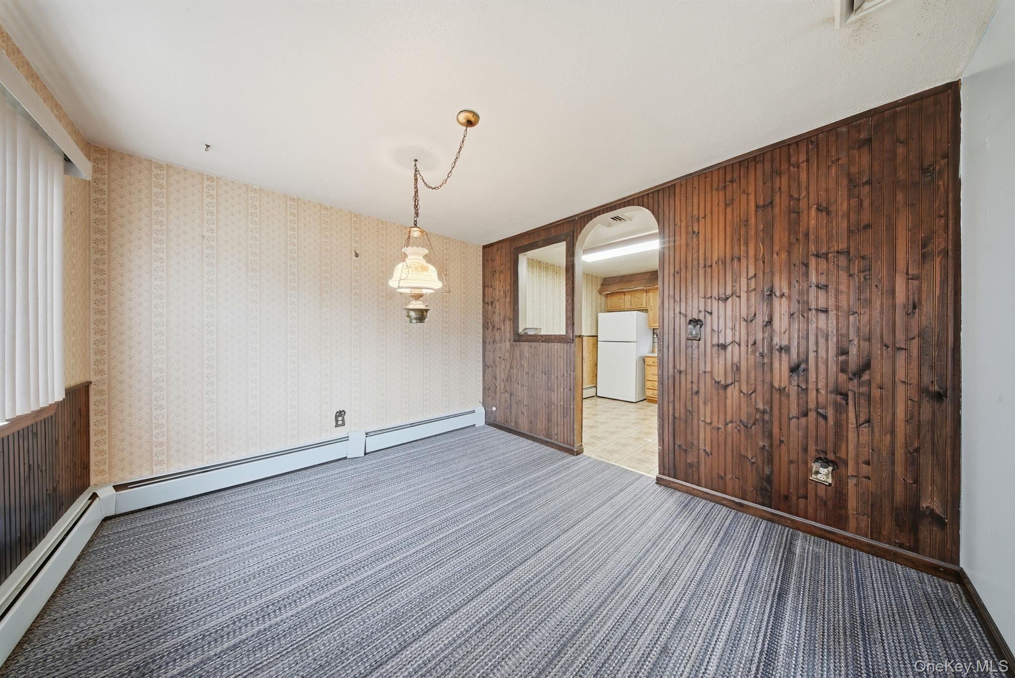 16 Mountain Avenue Middletown, NY 10940 - Photo 11 of 35 a view of a room with wooden floor and windows