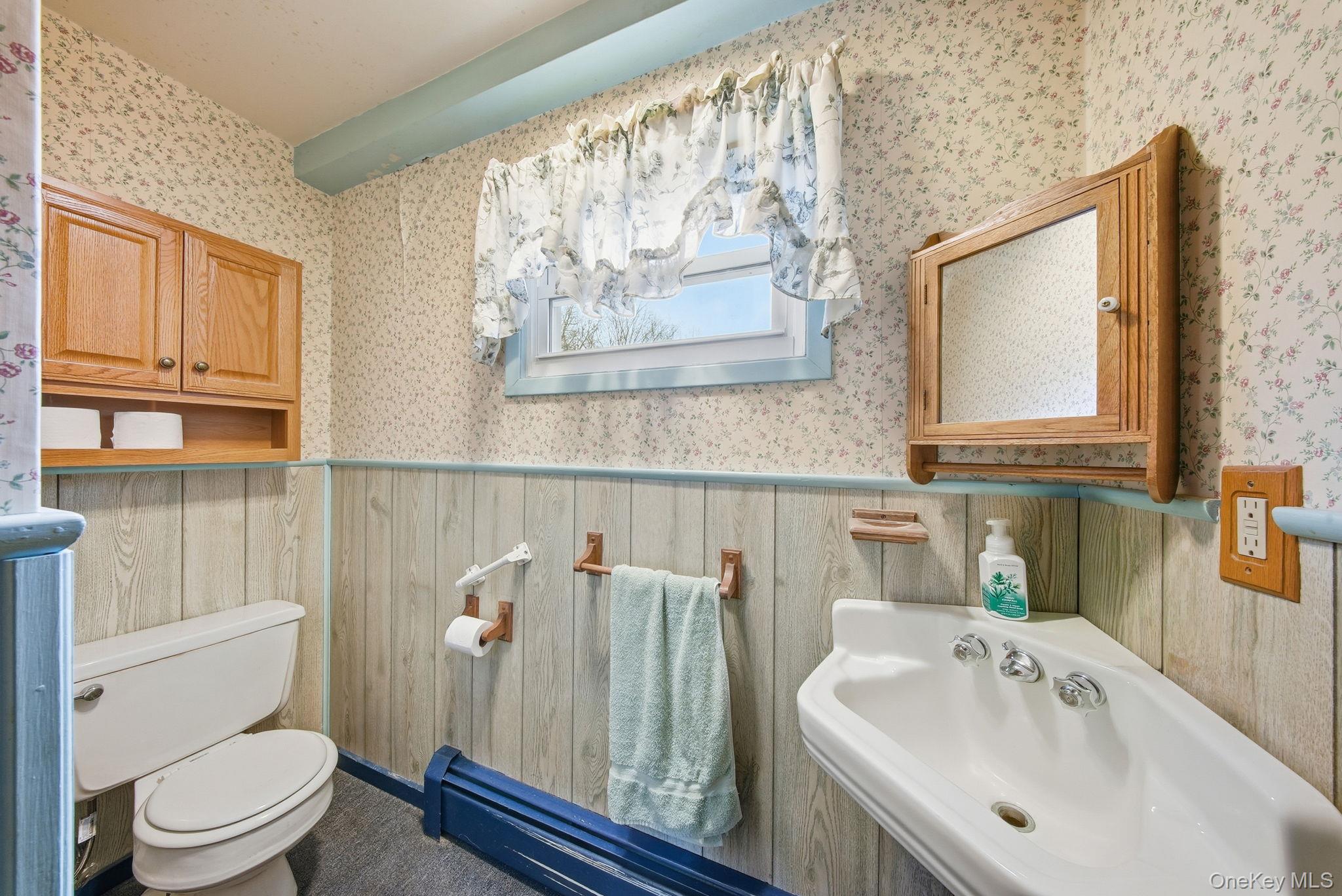16 Mountain Avenue Middletown, NY 10940 - Photo 13 of 35 a bathroom with a sink mirror and toilet