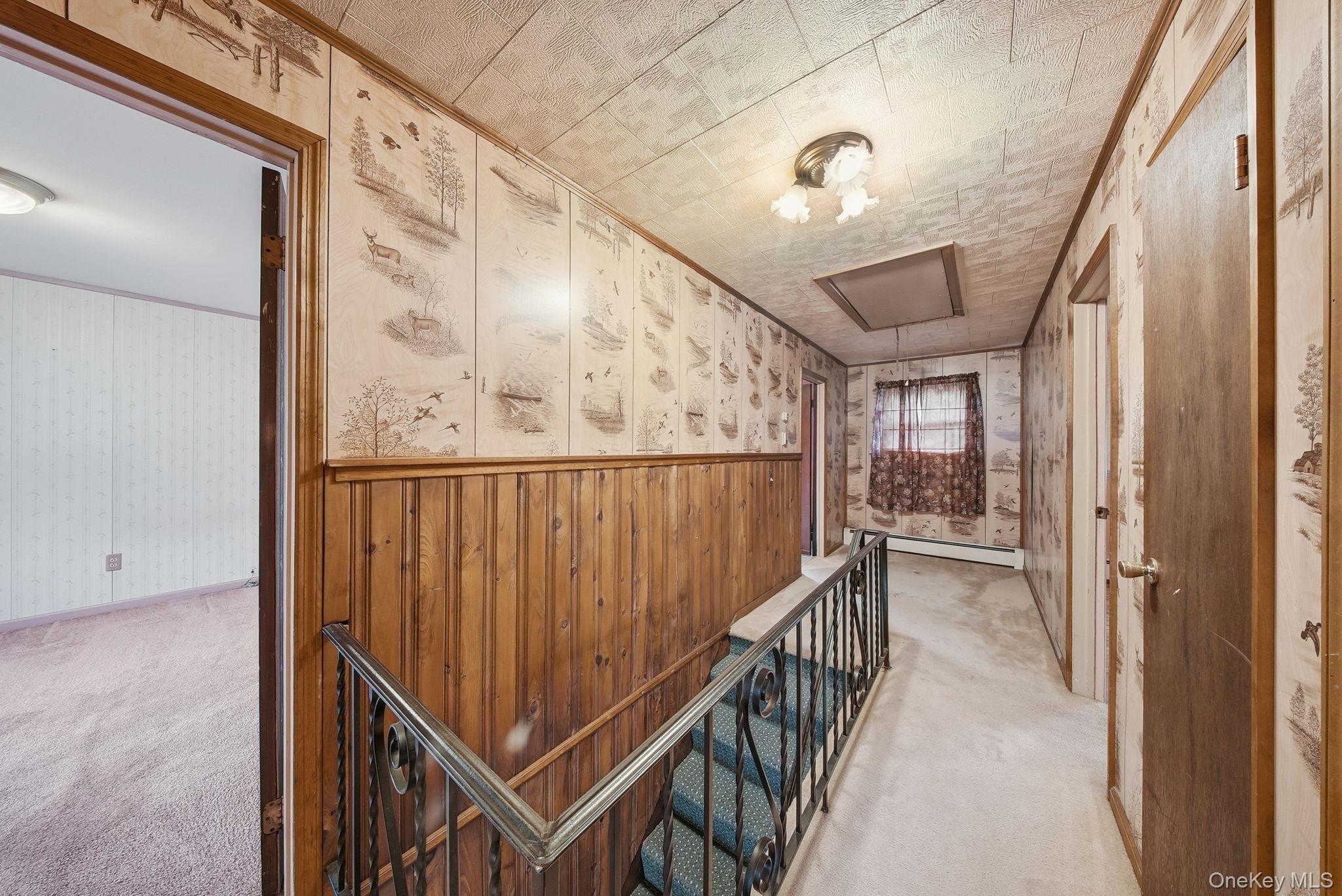 16 Mountain Avenue Middletown, NY 10940 - Photo 14 of 35 a view of a hallway with wooden floor and staircase