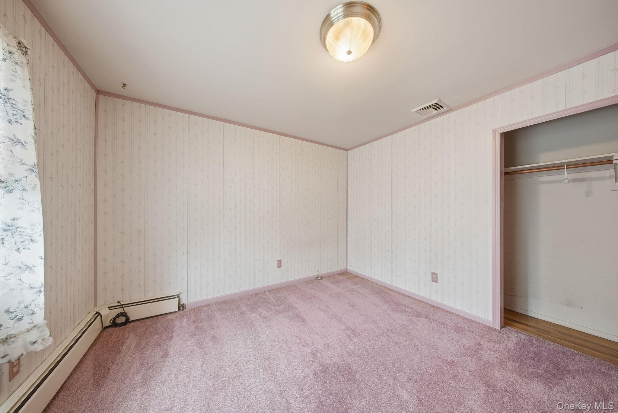 16 Mountain Avenue Middletown, NY 10940 - Photo 24 of 35 an empty room with windows