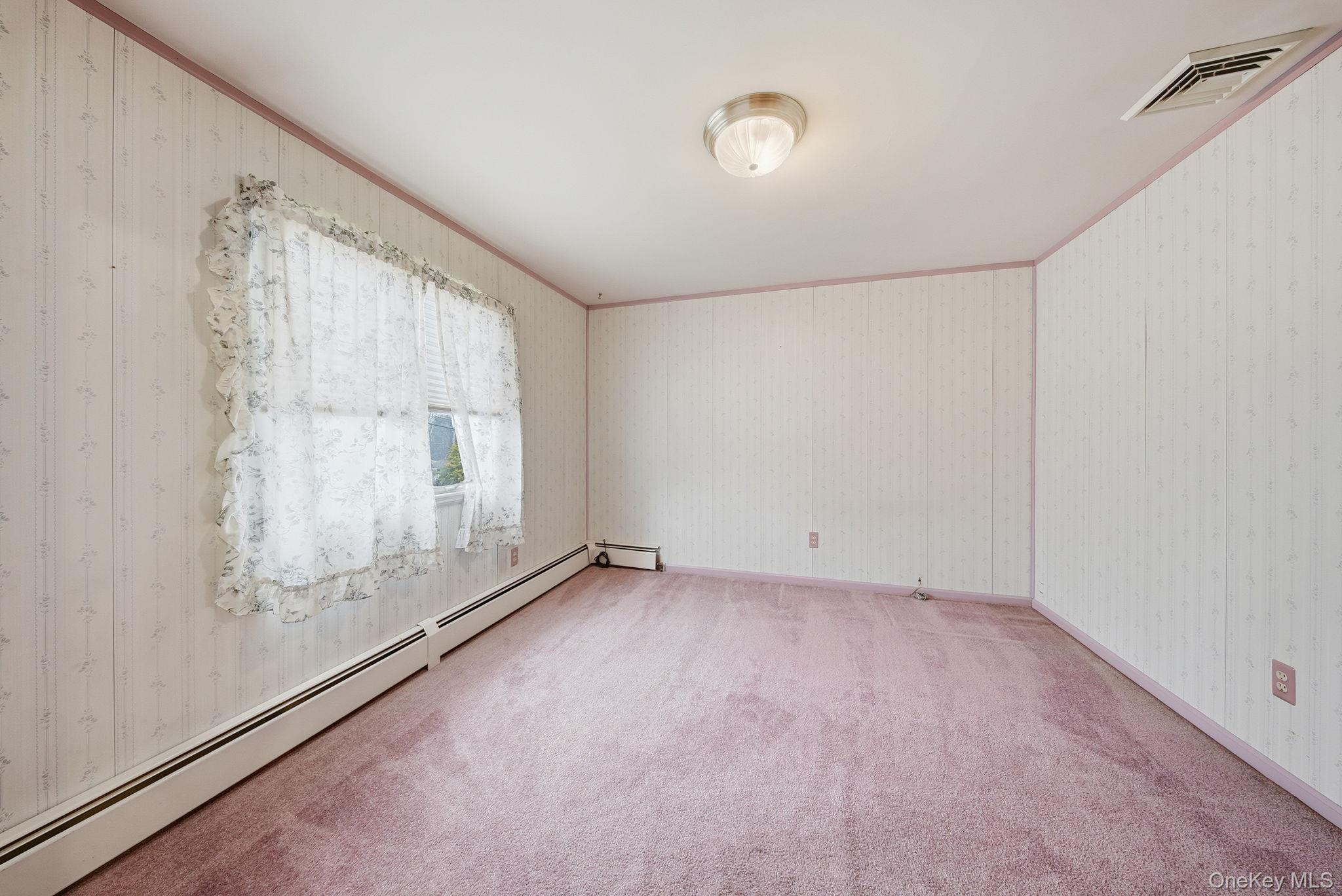 16 Mountain Avenue Middletown, NY 10940 - Photo 25 of 35 a view of an empty room with a window