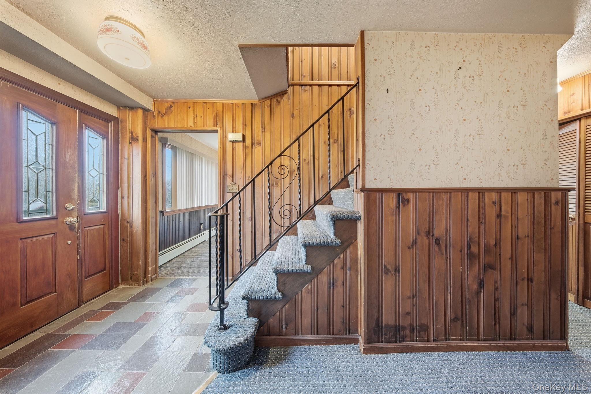 16 Mountain Avenue Middletown, NY 10940 - Photo 5 of 35 a view of entryway with wooden floor and stairs