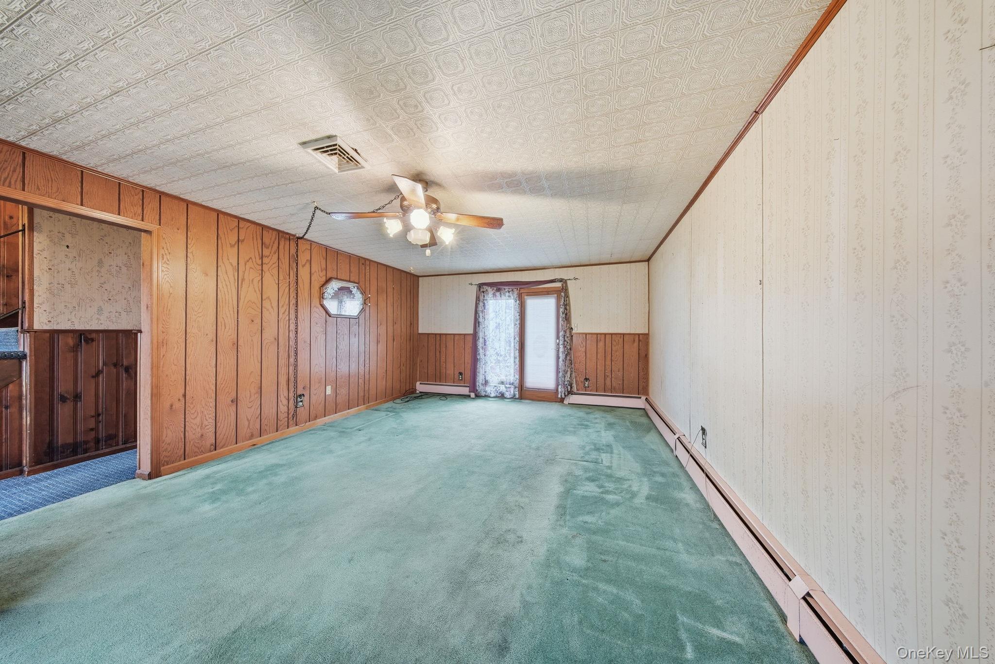 16 Mountain Avenue Middletown, NY 10940 - Photo 8 of 35 a view of a livingroom with a staircase