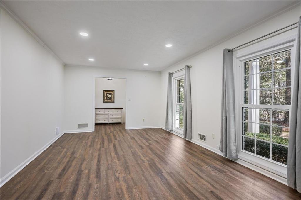 4505 Cochran Mill Road Fairburn, GA 30213 - Photo 6 of 36 wooden floor in an empty room with a window