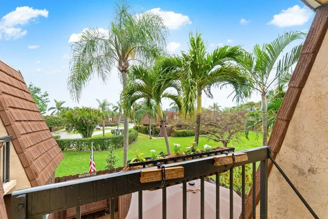 a view of street from a balcony