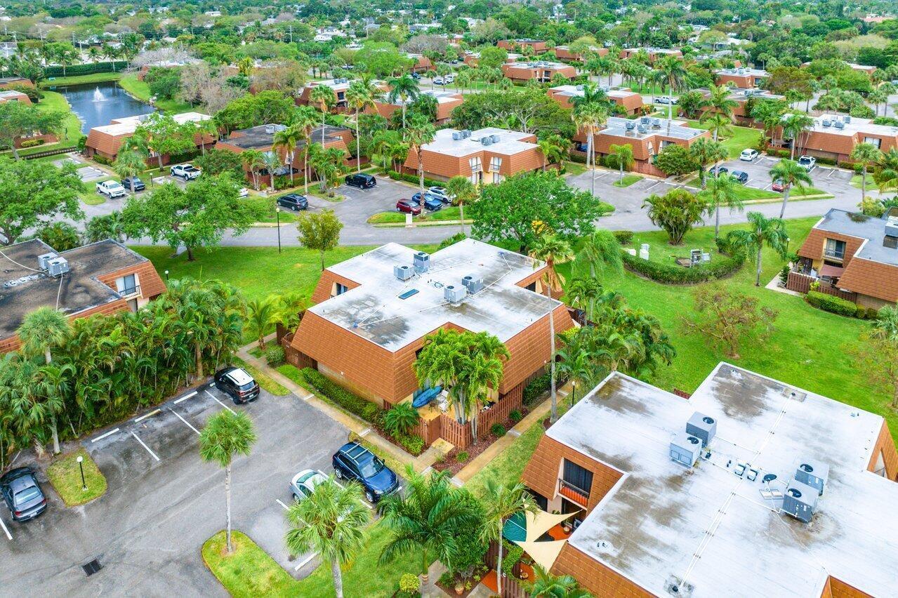 825 Center Street, Unit 13B Jupiter, FL 33458 - Photo 29 of 39 an aerial view of residential houses with outdoor space
