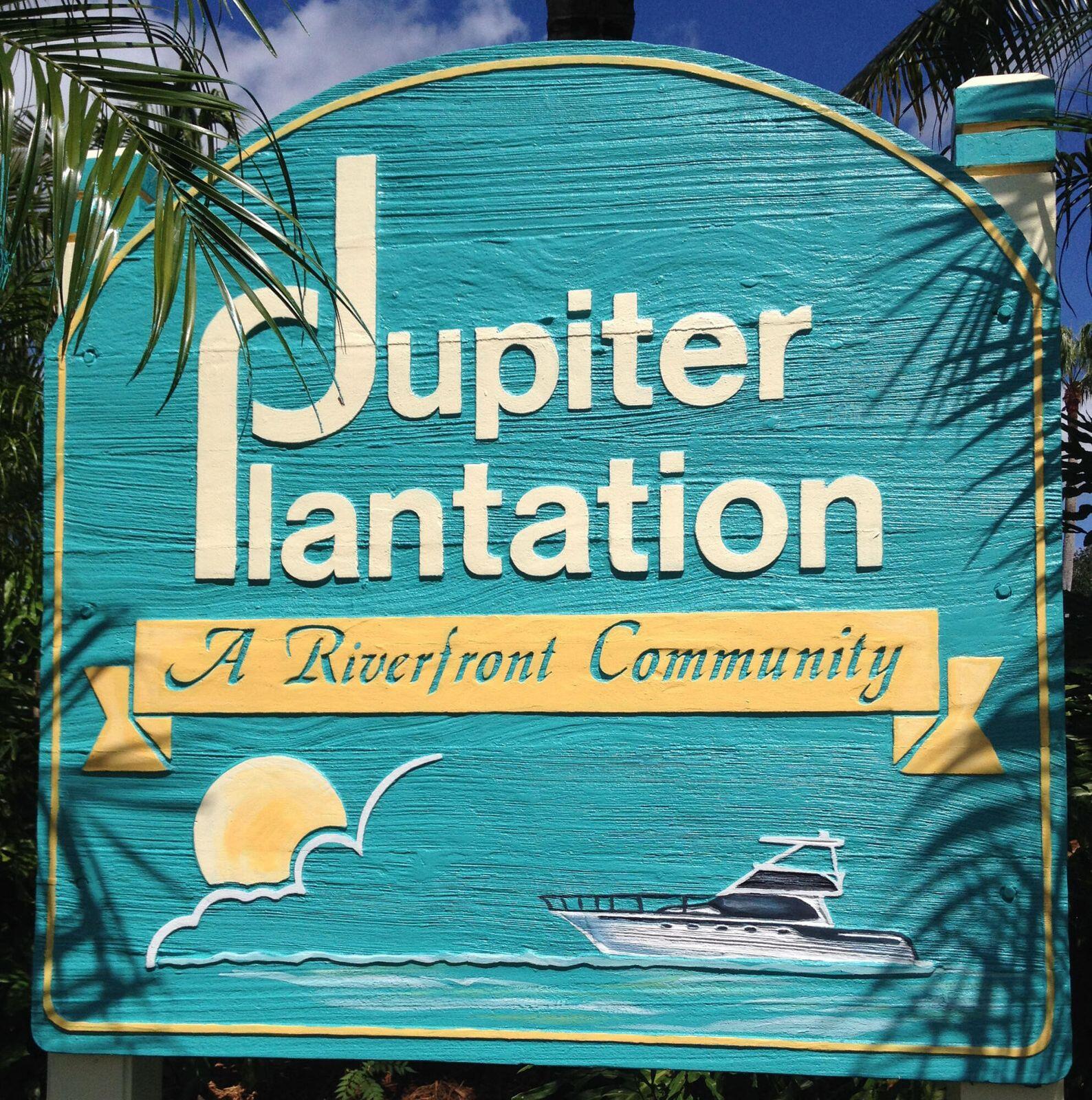 825 Center Street, Unit 13B Jupiter, FL 33458 - Photo 39 of 39 a sign that is on a wall