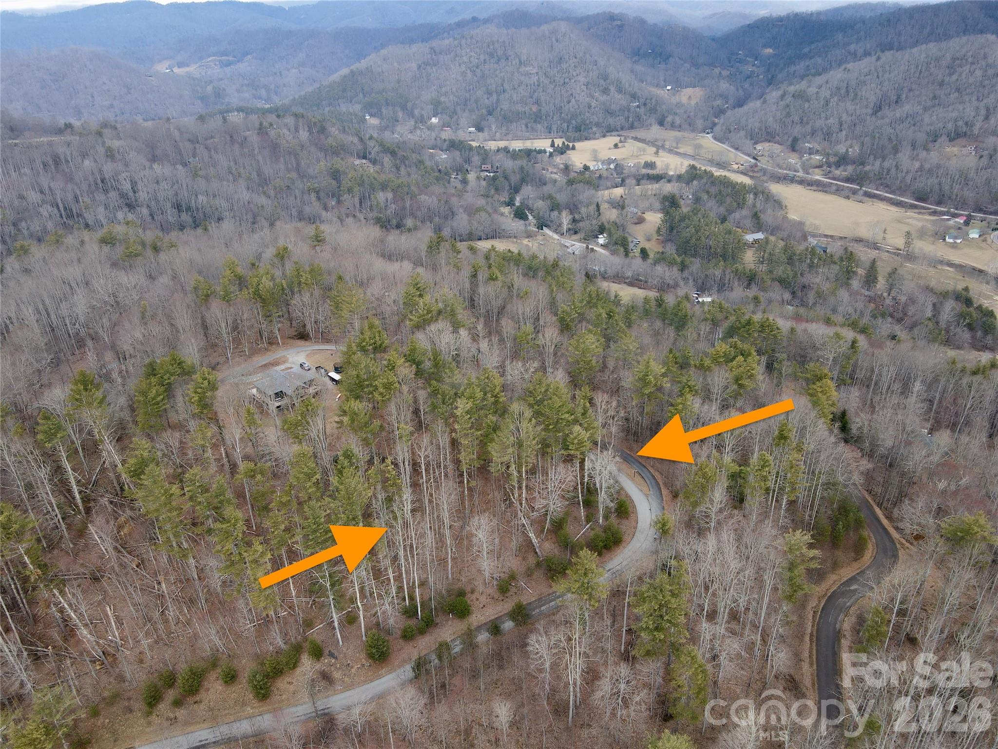 Tbd Mantera Ridge Sugar Grove, NC 28679 - Photo 15 of 16 an aerial view of a house with a yard and a lake view