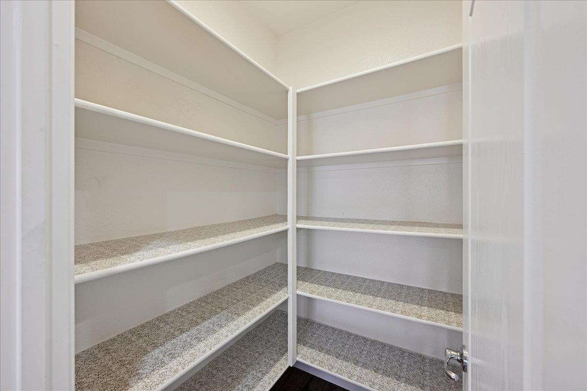 706 Wagon Trail Way Rocklin, CA 95765 - Photo 21 of 61 a view of walk in closet with empty racks