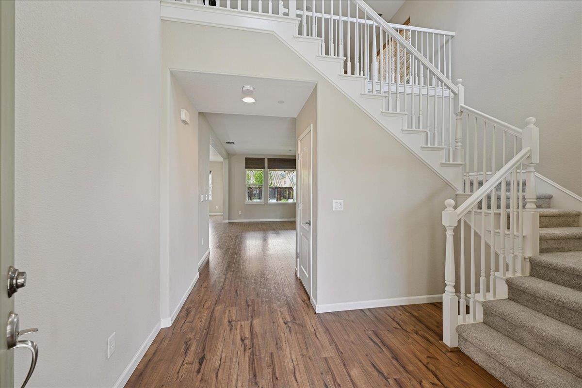 706 Wagon Trail Way Rocklin, CA 95765 - Photo 6 of 61 a view of entryway and hall with wooden floor