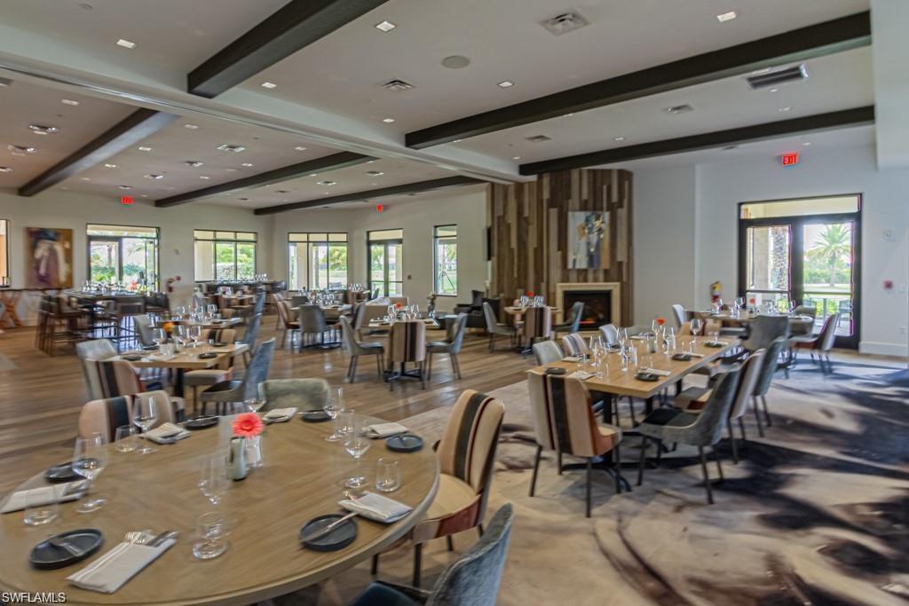 8756 Bellano Court, Unit 1104 Naples, FL 34119 - Photo 23 of 32 Barrel House formal dining room, outside wrap around patio area