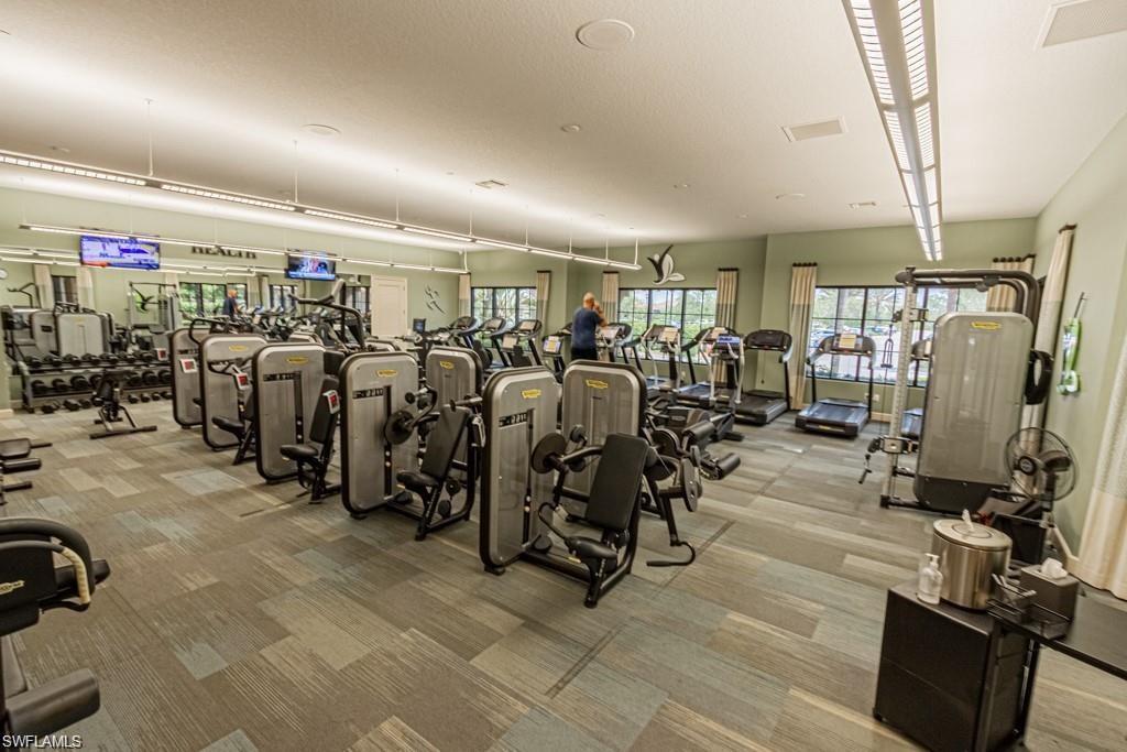 8756 Bellano Court, Unit 1104 Naples, FL 34119 - Photo 30 of 32 Fully equipped gym with free weights , separate classroom for yoga, line dancing & many more speciality classes.