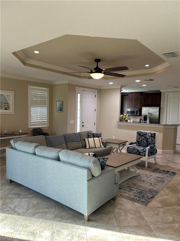 8756 Bellano Court, Unit 1104 Naples, FL 34119 - Photo 10 of 32 view toward kitchen