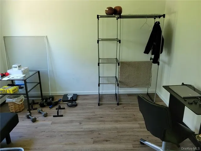 a view of a big yard with large trees