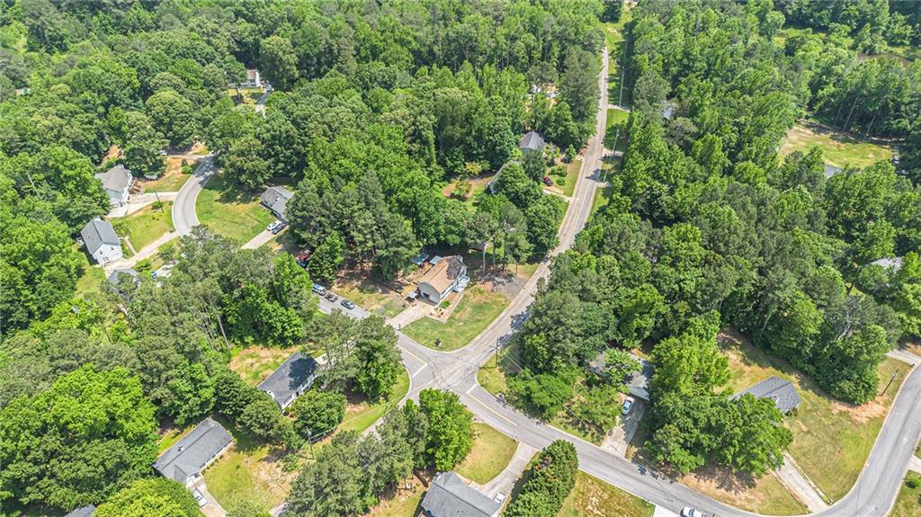275 Clyde Cole Road Dallas, GA 30157 - Photo 1 of 1 an aerial view of residential house with outdoor space and trees all around