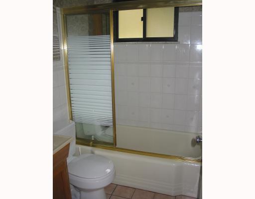 5203 Ranchview Drive Baldwin, PA 15236 - Photo 7 of 10 Other. Updated full bathroom on main floor. Ceramic tile floor. Attactive ceramic tile around tub and shower area. Pretty glass shower doors. Oak vanity.