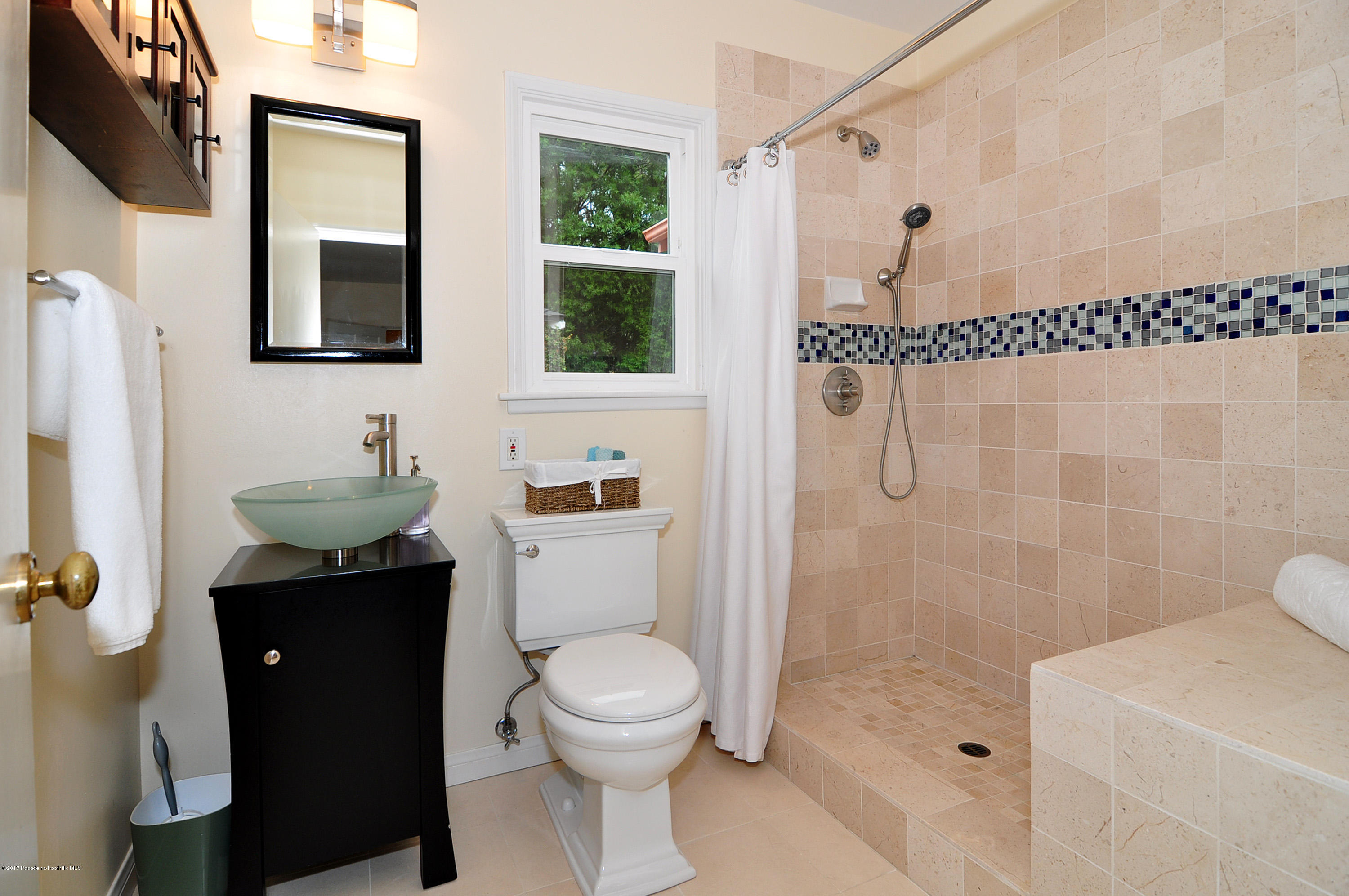 730 West Roses Road San Gabriel, CA 91775 - Photo 22 of 42 a bathroom with a sink a toilet and shower