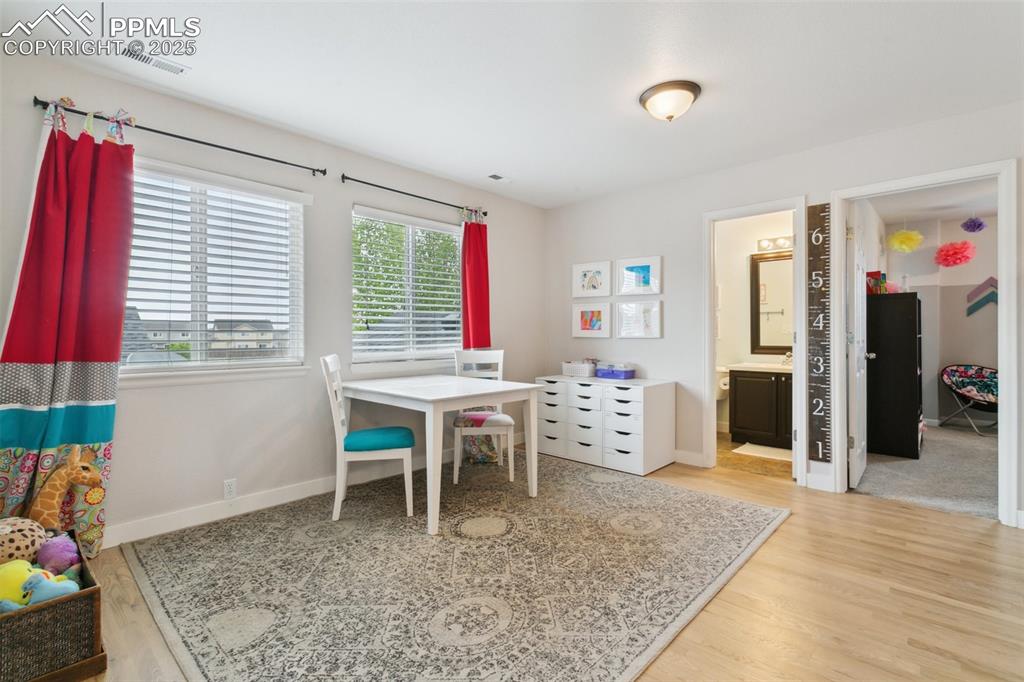 12912 Fishers Island Road Peyton, CO 80831 - Photo 21 of 45 a view of a livingroom with furniture and window