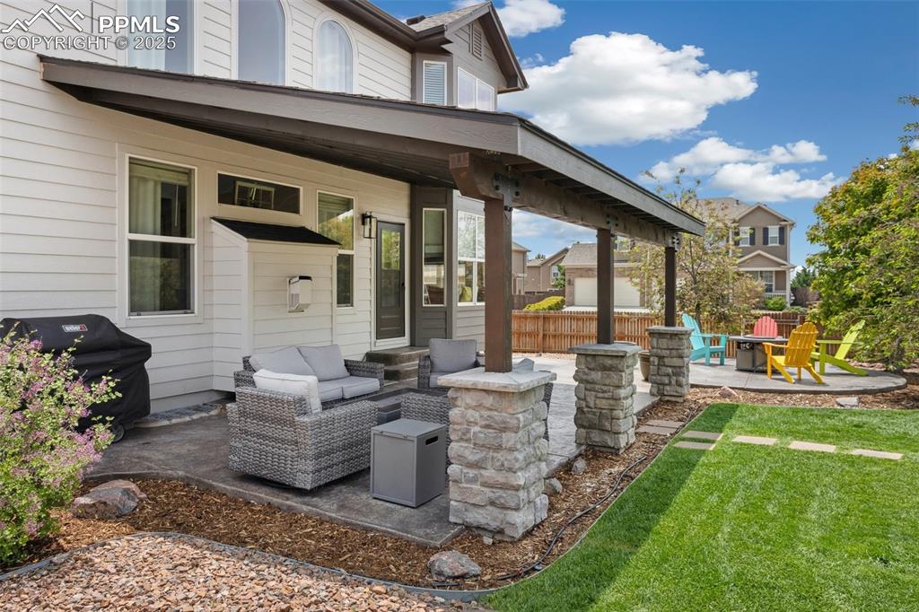 12912 Fishers Island Road Peyton, CO 80831 - Photo 37 of 45 a front view of a house with garden