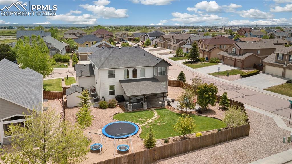 12912 Fishers Island Road Peyton, CO 80831 - Photo 42 of 45 an aerial view of a house with yard swimming pool and outdoor seating