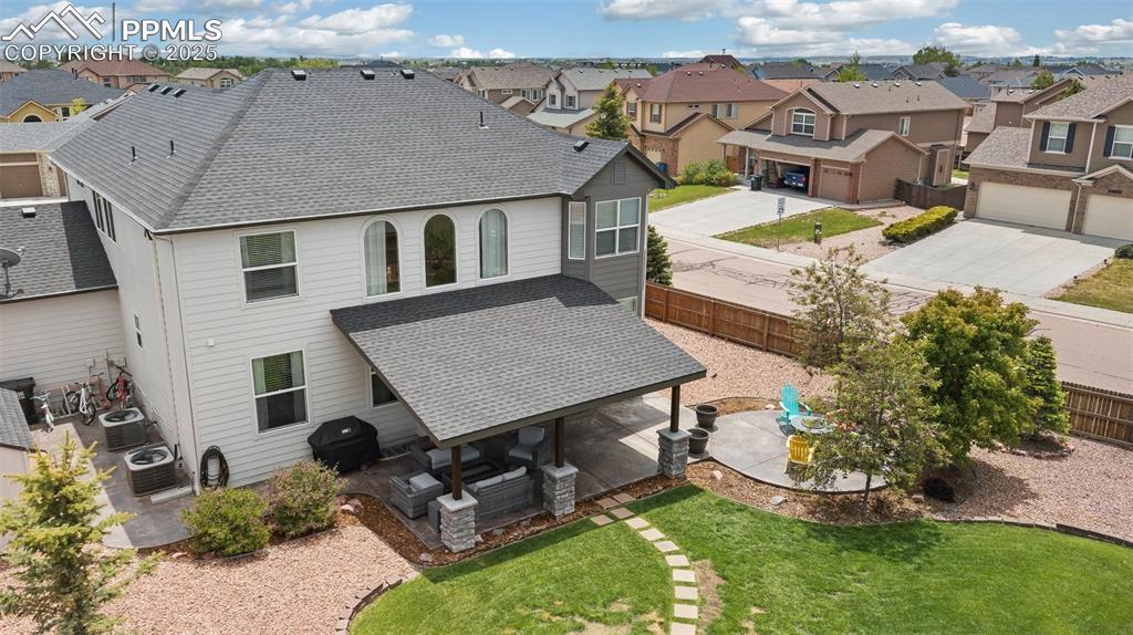 12912 Fishers Island Road Peyton, CO 80831 - Photo 43 of 45 an aerial view of a house with garden
