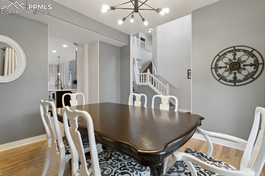 12912 Fishers Island Road Peyton, CO 80831 - Photo 5 of 45 a view of a dining room with furniture