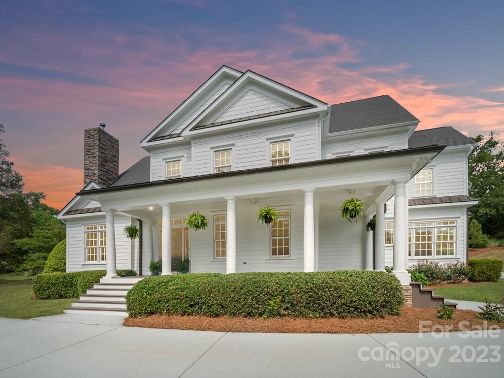 14707 June Washam Road Davidson, NC 28036 - Photo 1 of 48 front view of a house with a yard