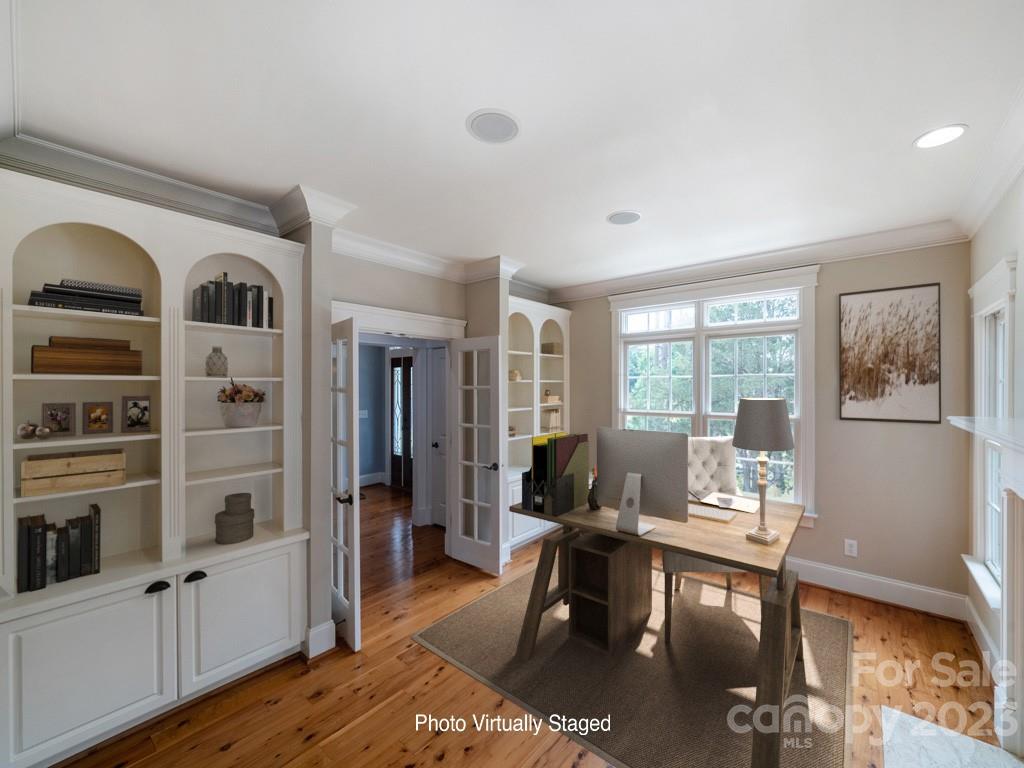 14707 June Washam Road Davidson, NC 28036 - Photo 15 of 48 a workspace with furniture hardwood and a window