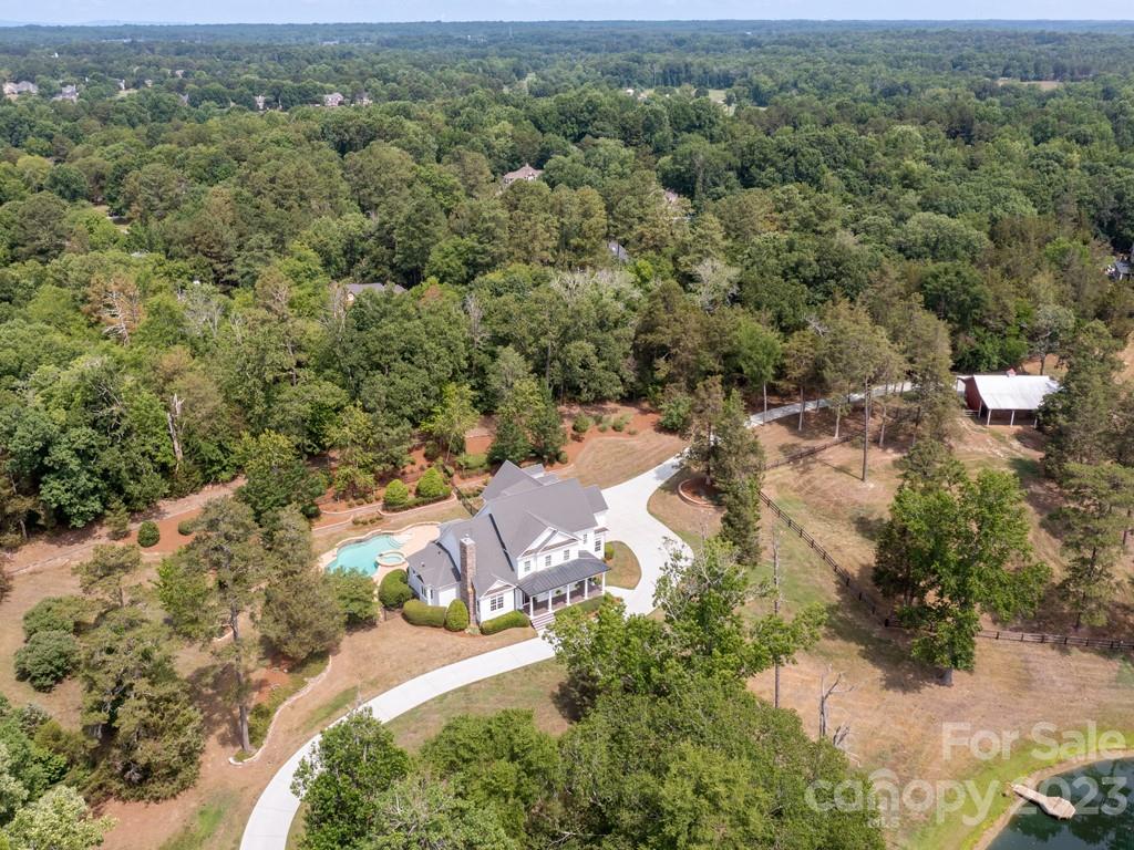 14707 June Washam Road Davidson, NC 28036 - Photo 2 of 48 an aerial view of residential house with outdoor space