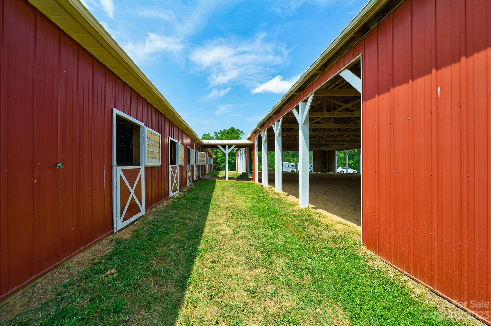 14707 June Washam Road Davidson, NC 28036 - Photo 42 of 48 a view of backyard with hardwood and deck