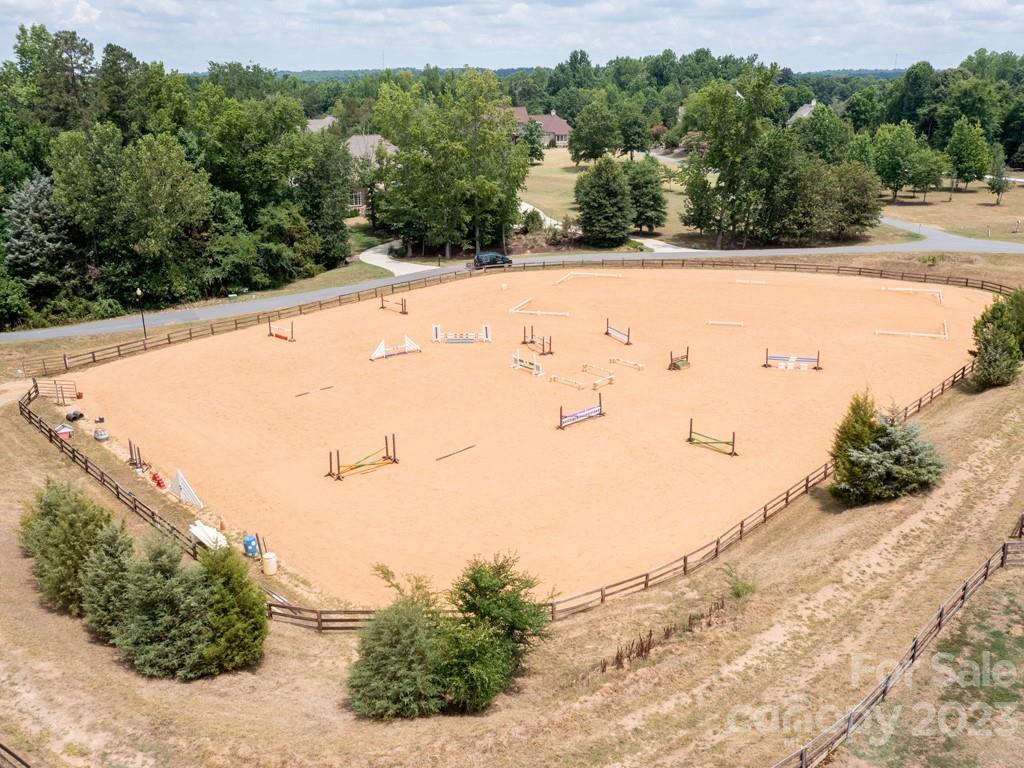 14707 June Washam Road Davidson, NC 28036 - Photo 45 of 48 a view of a dry yard with a large tree