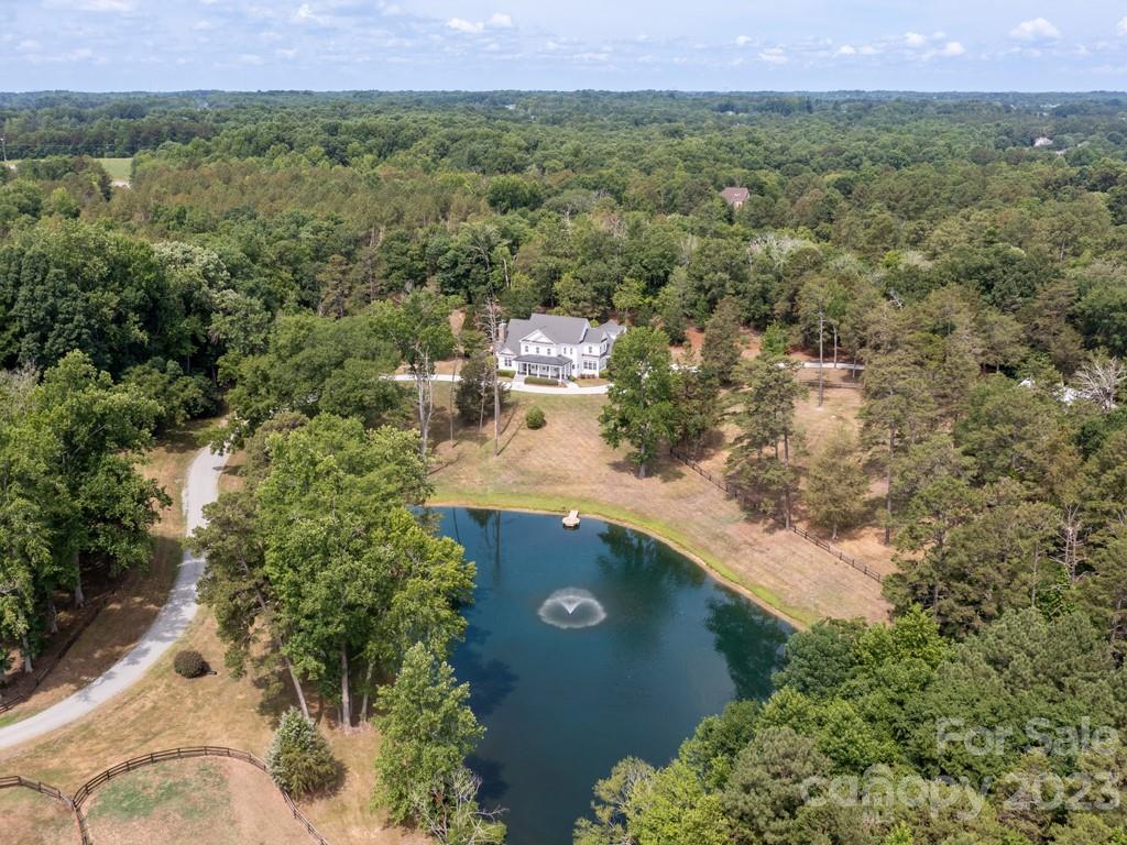 14707 June Washam Road Davidson, NC 28036 - Photo 47 of 48 an aerial view of a house with a yard