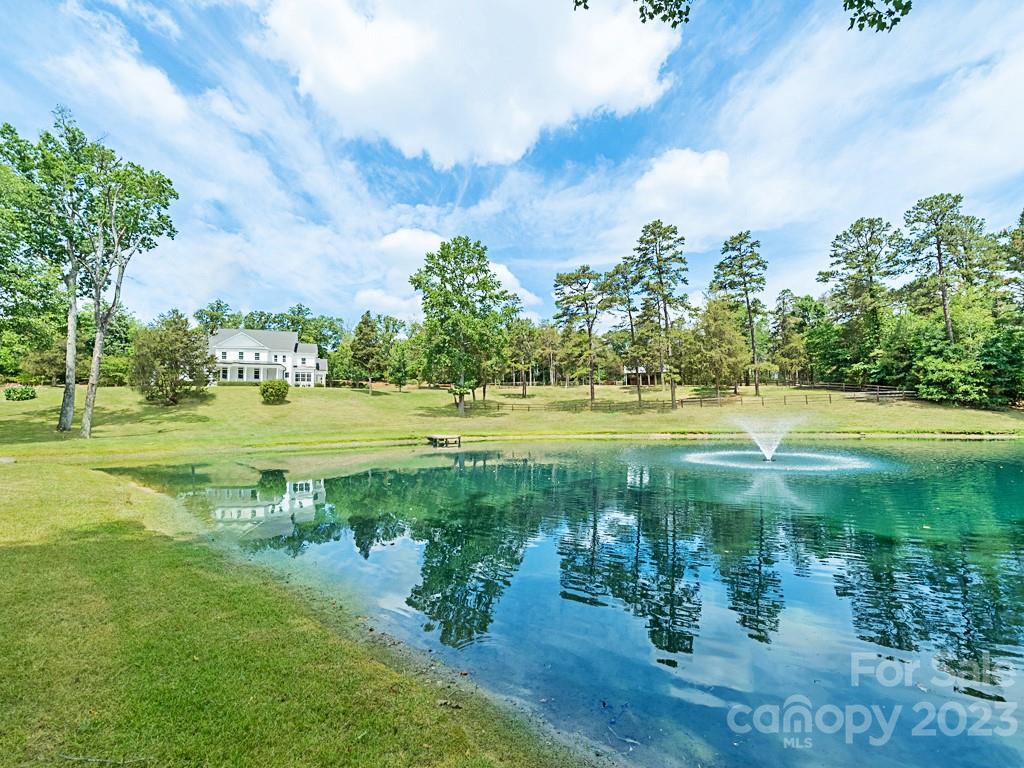 14707 June Washam Road Davidson, NC 28036 - Photo 7 of 48 a view of a lake view with a big yard