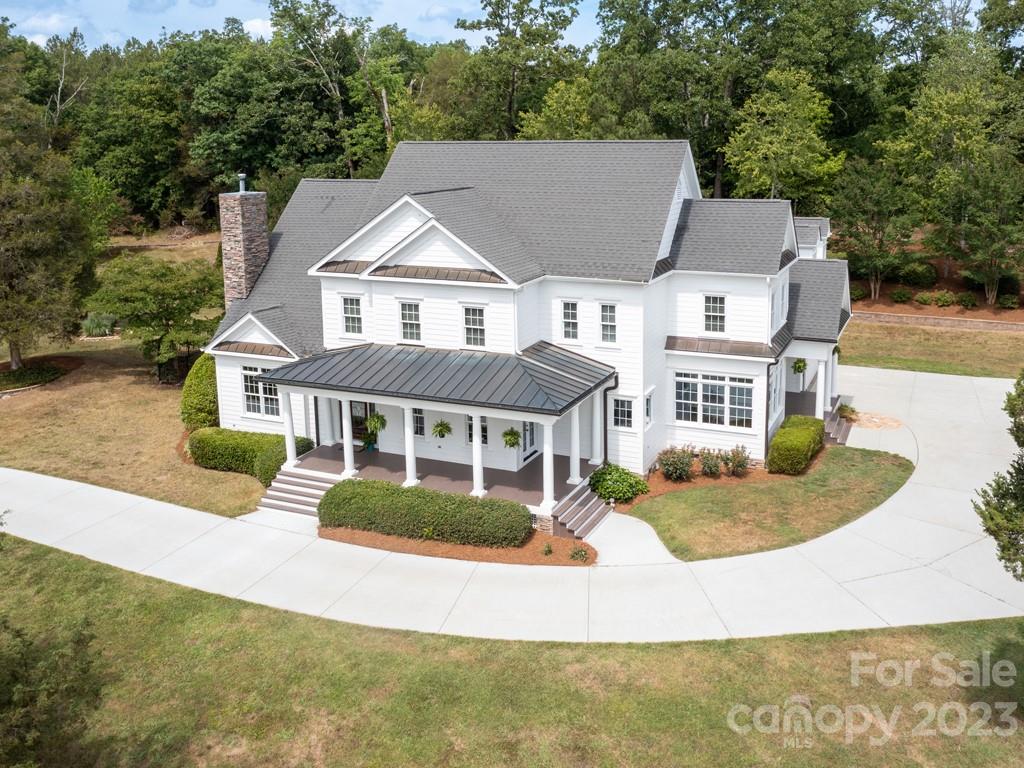 14707 June Washam Road Davidson, NC 28036 - Photo 10 of 48 an aerial view of a house with a yard