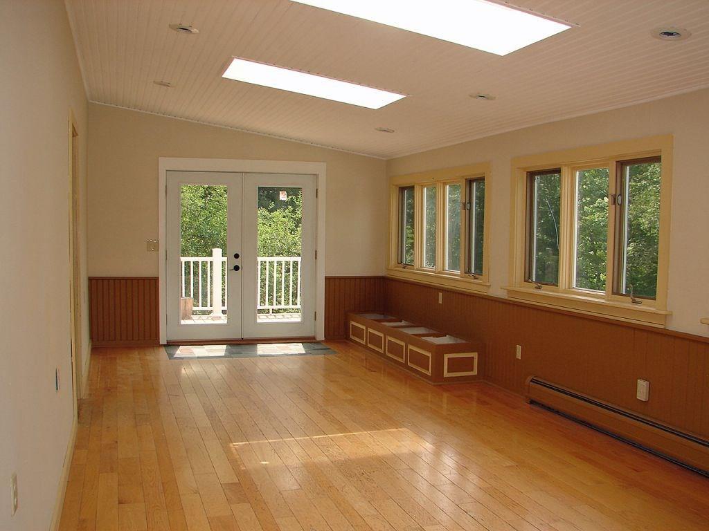 2 Thomas Road York, ME 03909 - Photo 8 of 22 Large sunroom with storage bench and...