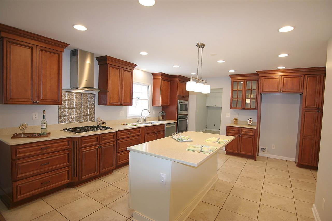 7801 Audubon Drive Raleigh, NC 27615 - Photo 11 of 25 Imagine Morning Coffee at this Beautiful Center Island's Eat-at Bar ... Jou just may want to Take the Day Off in order to Grab a few Extra Moments to Savour the Essence of the Beautiful Kitchen. Kitchen