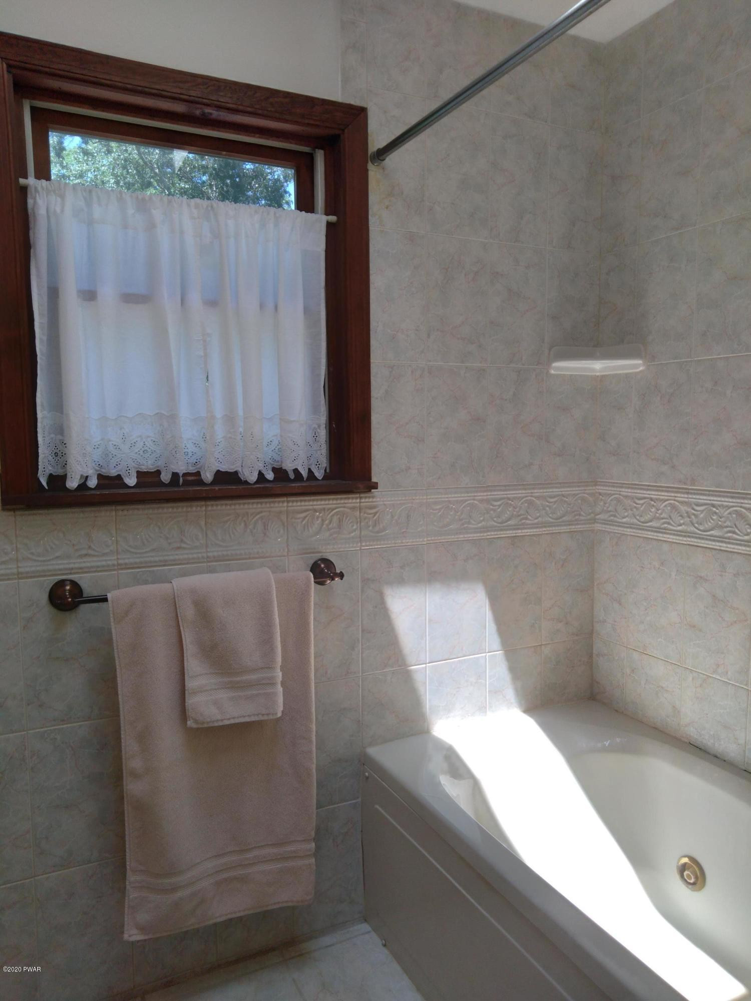 833 Milford Road Dingmans Ferry, PA 18328 - Photo 28 of 35 Upper level bathroom 2